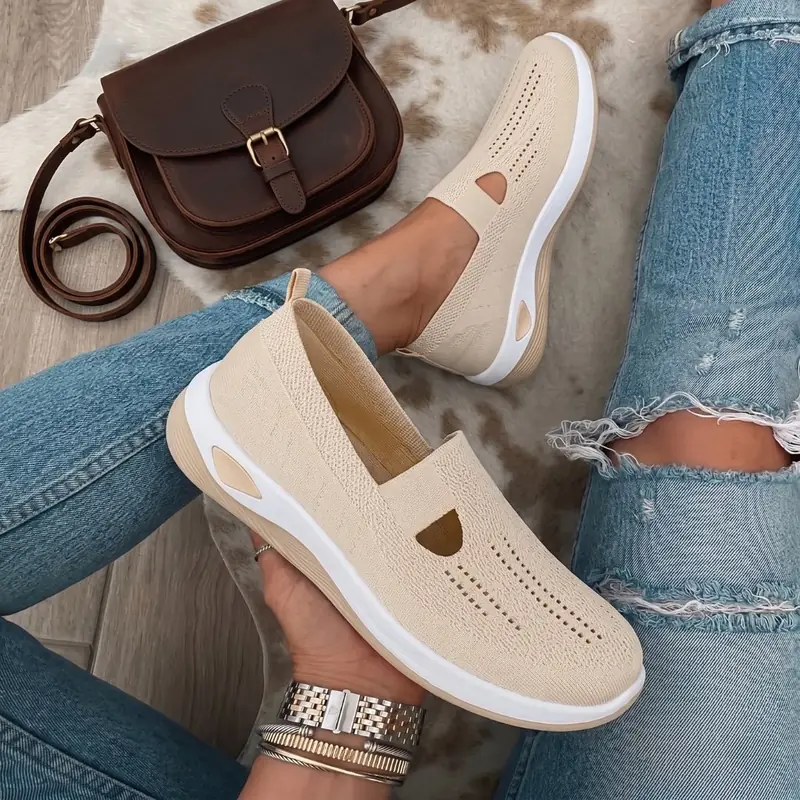 Woman wearing breathable knit slip-on walking flats
